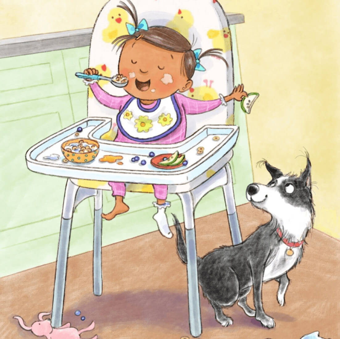 Baby in high chair eating and feeding some to the dog