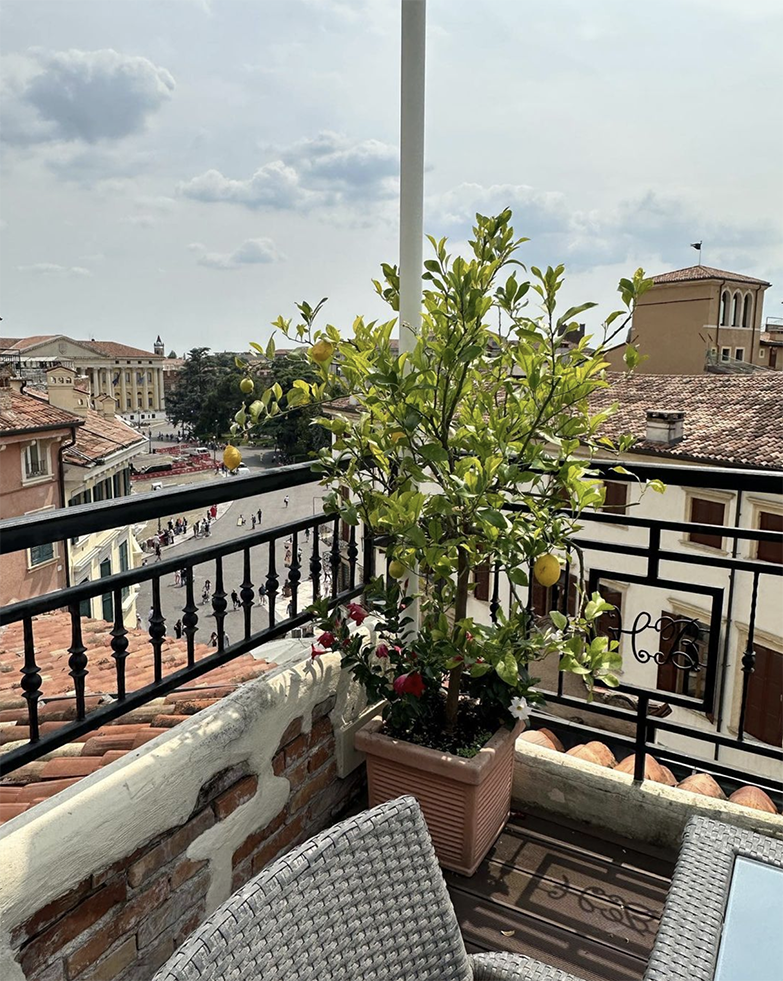 Giving the feet a break, relaxing on my terrace before tonight’s stroll in Verona